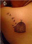 kafesten-ozgurluge-ucan-kuslar-dovmesi---bird-cage-tattoos