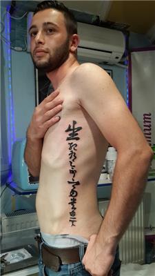 david-beckham-cince-yazi-dovmesi---david-beckham-chinese-kanji-tattoo