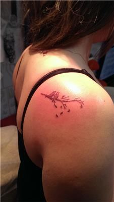 dal-uzerindeki-kuslar-dovmesi---bird-tattoos