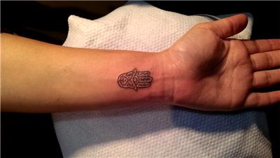 fatmanin-eli-dovmesi---hamsa-tattoo