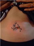 gobek-cicek-sarmasik-dovmesi---flowers-and-ivy-on-belly-tattoo
