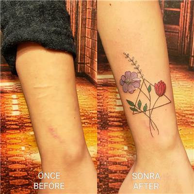 kesik-izleri-uzerine-ucgen-ve-cicekler-dovmesi