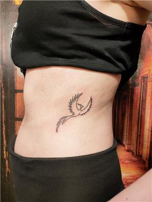 cizgisel-zumrudu-anka-kusu-dovmesi---minimal-phoenix-tattoo
