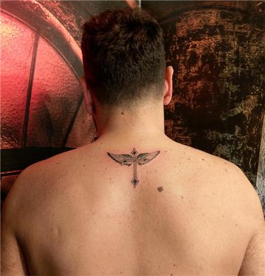 enseye-hac-ve-kanat-dovmesi---cross-and-wings-tattoo