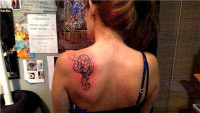 sirta-tribal-aslan-dovmesi---tribal-lion-tattoo-on-back