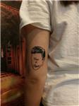 elvis-presley-cizgisel-yuz-cizimi-ve-sarki-sozu-dovmesi---elvis-presley-face-silhouette-now-or-never-tattoo