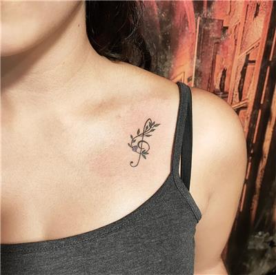 sol-anahtari-yapraklar-ve-cicek-dovmesi---treble-clef-leaves-and-flower-tattoo