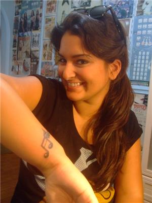 kanatli-nota-dovmesi---music-note-wings-tattoo-