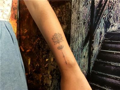 kol-uzerine-lotus-cicegi-ve-ok-dovmesi---lotus-arrow-arm-tattoo