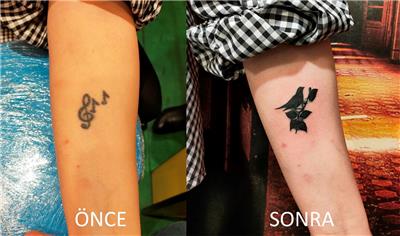 sol-anahtari-ve-notalar-dovmesini-kus-ile-kapatma-calismasi---tattoo-cover-up