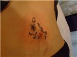 gobek-cicek-sarmasik-dovmesi---flowers-and-ivy-on-belly-tattoo