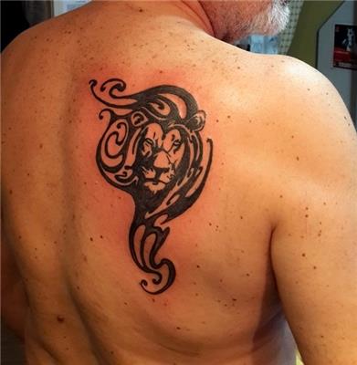 sirta-tribal-aslan-dovmesi---tribal-lion-tattoo-on-back